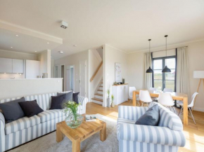 Premium Reetdachvilla mit 3 Schlafzimmern, Sauna und Kamin E05 in Dranske